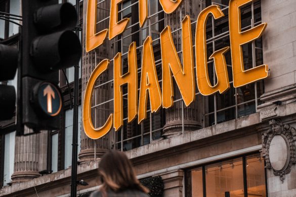 Photo of sign saying "Let's Change"