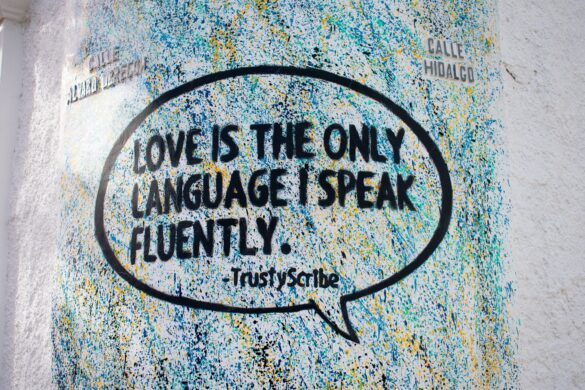 Photo of slogan "Love is the only language I speak fluently." Photo by Hannah Gibbs