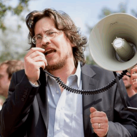 Photo of Roy Casagranda with a megaphone.